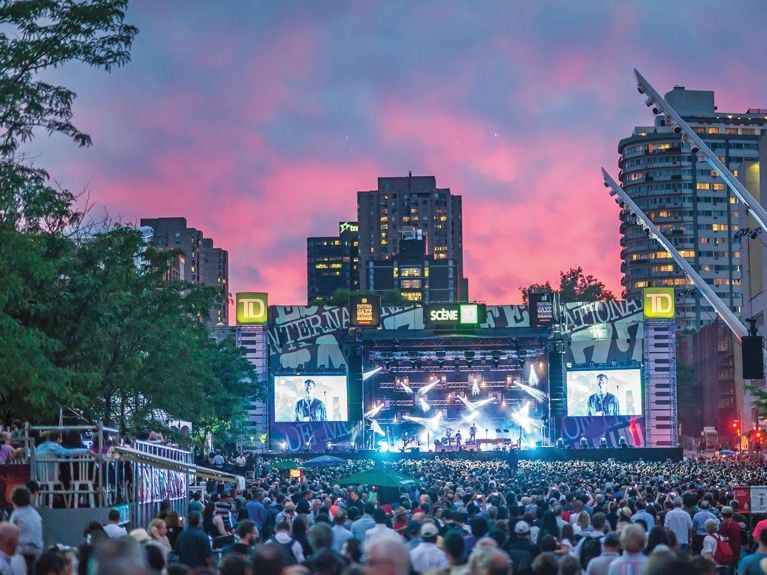Crowds at the Montreal International Jazz Festival for an article about the best Canadian getaways for summer.