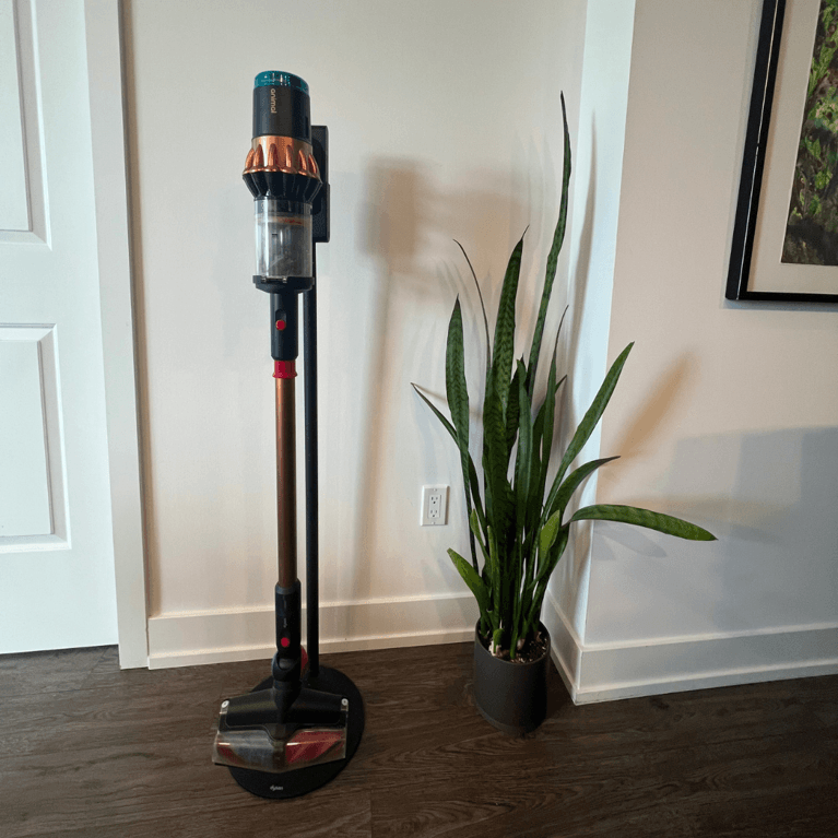 Dyson V16 Piston Animal Absolute vacuum and dock in living room