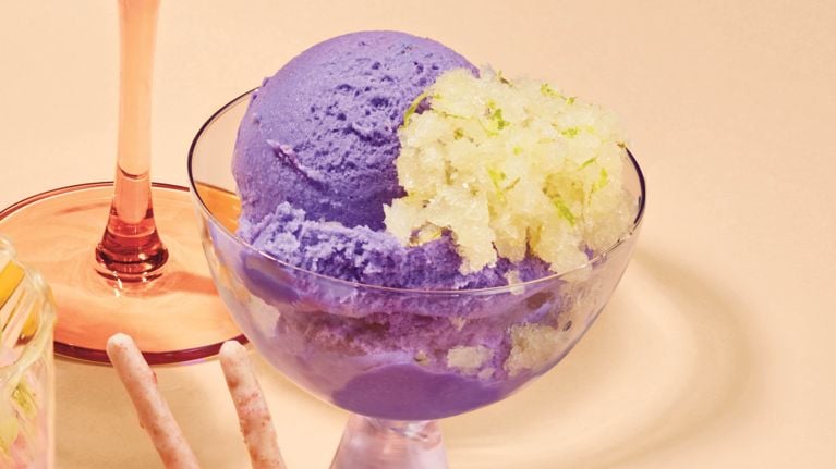 A bowl of purple ice cream topped with margarita granita.
