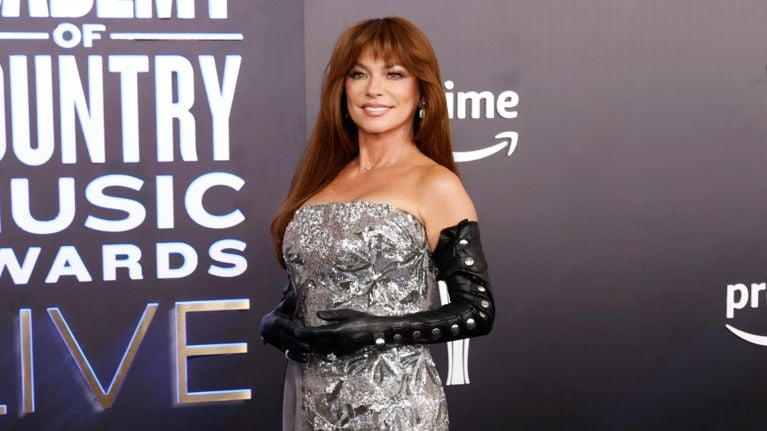 image of shania twain in a silver glittery dress for the 60th country music awards for an article about her experience with menopause
