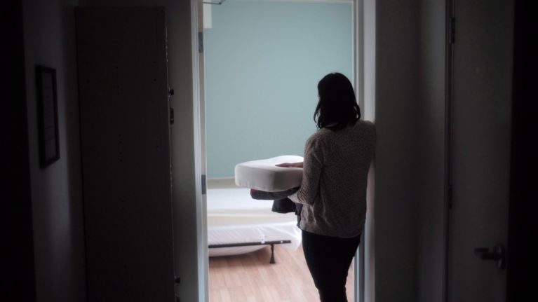 A staff member at a Toronto women’s shelter prepares a room. Shelters across Canada are bracing for a potential increase in intimate partner violence survivors during the World Cup.