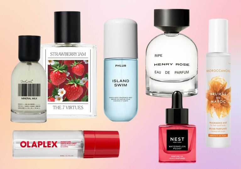 Bottles of perfume on a pink ombré background for an article about the best new perfumes for summer 2026.