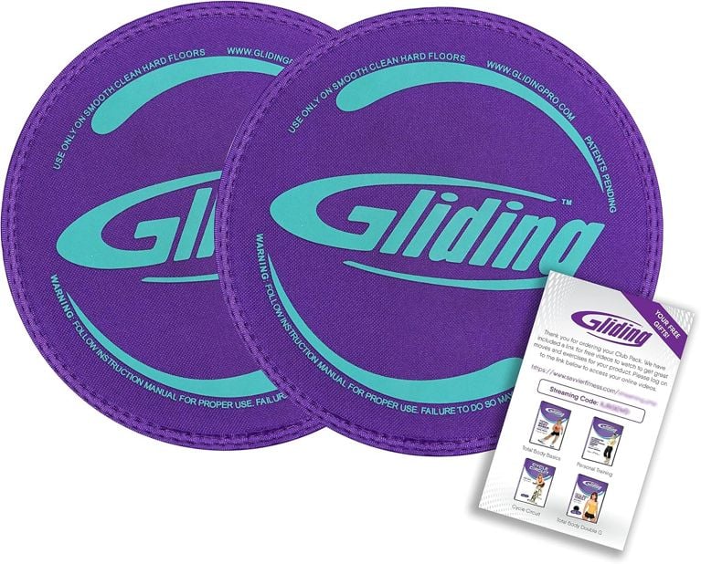 A pair of purple Gliding brand fitness sliders, used in a post on how to use fitness sliders