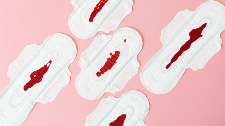 Photo of tampons on a pink backdrop